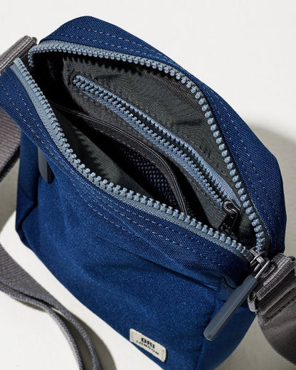 Tommy Bahama | Bond Deep Blue Canvas Crossbody / Deep Blue